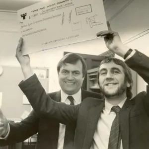 John Prescott hands over a cheques from Tyne Wear County Council to Norman Watson of John Prescott hands over a cheques from Tyne Wear County Council to Norman Watson of