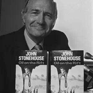 John Stonehouse, former MP pictured with his book, Oil on the Rift, August 1987