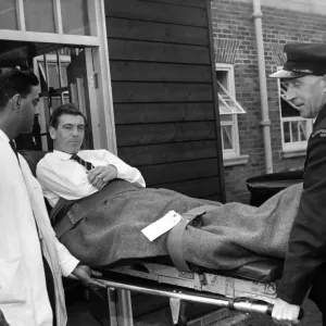 Johnny Haynes leaves Hospital. England and Fulham Soccer star Johnny Haynes is carried Johnny Haynes leaves Hospital. England and Fulham Soccer star Johnny Haynes is carried