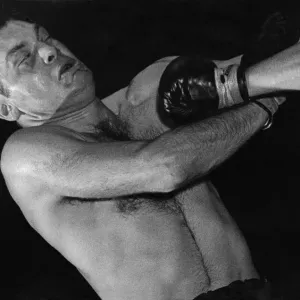 Johnny Williams v. Al Bernard. A full blooded straight left from Williams sends Al