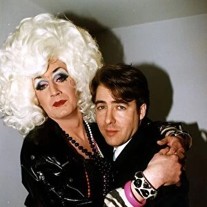 Jonathan Ross TV presenter with arms around drag queen Lily savage