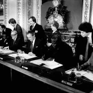 Joshua Nkomo signing the Final Agreement on the future of Rhodesia as the independent