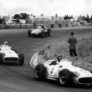 Juan Manuel Fangio - Racing driver in action on the circuit of Zandvoort Juan Manuel Fangio - Racing driver in action on the circuit of Zandvoort