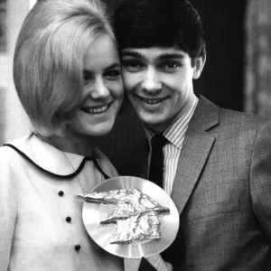 Judi Johnson presents the Super National Getaway trophy to American singer Gene Pitney
