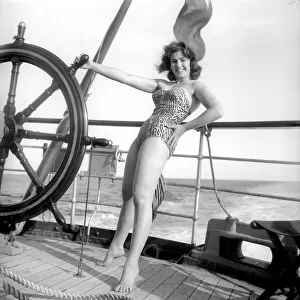 Julie Alexander models the latest swimwear whilst on a sail ship in the channel