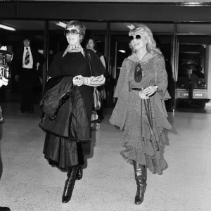 Julie Andrews and Dyan Cannon flew into Heathrow together after a chance meeting aboard a Julie Andrews and Dyan Cannon flew into Heathrow together after a chance meeting aboard a
