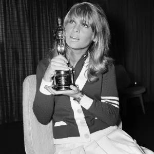 Julie Christie and boyfriend Don Bessant arriving at London Airport after she was awarded Julie Christie and boyfriend Don Bessant arriving at London Airport after she was awarded