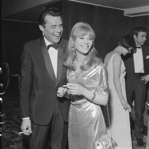 Julie Christie and Dirk Bogarde celebrate their film award win each Julie Christie and Dirk Bogarde celebrate their film award win each