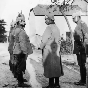 Kaiser Wilhelm II seen here inspecting a group of army doctors in a village close to