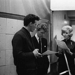 Karen Kay singer and actress in the recording studio discussing musical score with two
