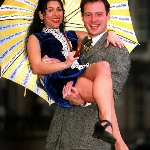 Kathryn Dixon Lifted by John Leslie with Yellow Umbrella Print Kathryn Dixon Lifted by John Leslie with Yellow Umbrella Print