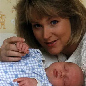 Kathryn Holloway TV Presenter of UK Livings Agony Programme with baby son James Holloway