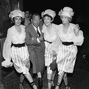 Kay Kendall left, enjoying a dance with ( left to right) Noel Coward