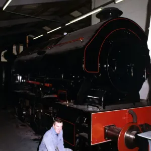 Keith McNulty, Hon. Treasurer with a Bagnall 0-6-0 locomotive built in 1950 at the George Keith McNulty, Hon. Treasurer with a Bagnall 0-6-0 locomotive built in 1950 at the George