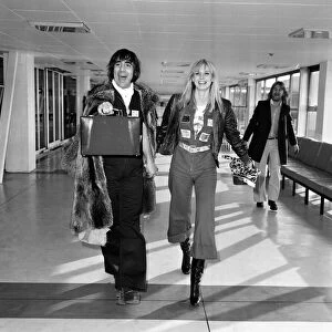 Keith Moon, drummer of The Who rock group, pictured leaving Heathrow Airport for holiday