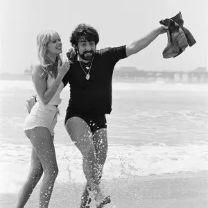 Keith Moon, drummer of The Who rock group with model Annette Lax in the resort of Malibu Keith Moon, drummer of The Who rock group with model Annette Lax in the resort of Malibu
