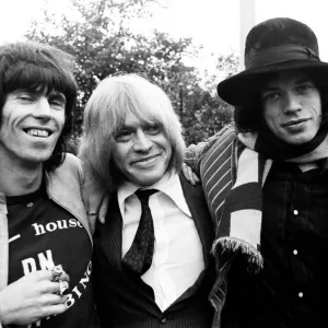 Keith Richards, Brian Jones and Mick Jagger of The Rolling Stones after Jones narrowly