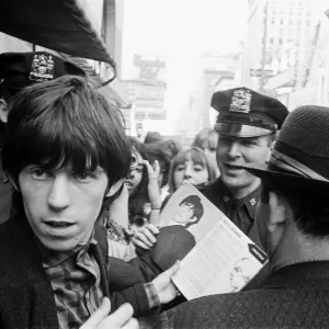 Keith Richards of The Rolling Stones signing autographs on Broadway. 2nd June 1964 Keith Richards of The Rolling Stones signing autographs on Broadway. 2nd June 1964