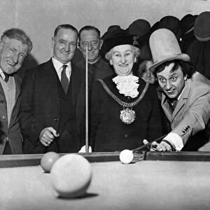 Ken Dodd - comedian from Liverpool. Ken plays snooker at The Knotty Ash