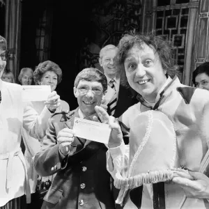 Ken Dodd Presents Cheque to British Heart Foundation Print 1983