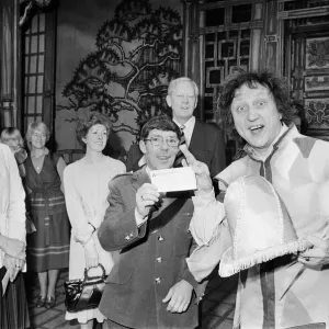 Ken Dodd presents £1000 cheque to British Heart Foundation, Coventry 1983 Print