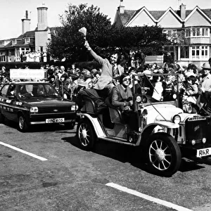Ken Dodd leads a parade in Hoylake in aid the Clatterbridge Hospital Cancer Research