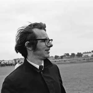 Ken Loach, (film director) on the school football playing field