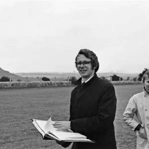 Ken Loach, (film director) on the school football playing field