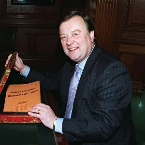 Kenneth Clarke MP and Chancellor of the Exchequer with the Budget Box at the Treasury