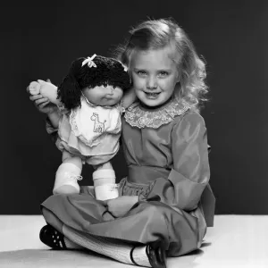 Keri Reynolds, aged 5, with her Cabbage Patch doll. 2nd December 1983 Keri Reynolds, aged 5, with her Cabbage Patch doll. 2nd December 1983
