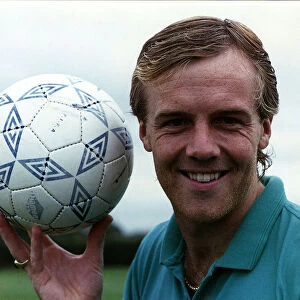 Kerry Dixon, former footballer who played for Chelsea. Holding a football and smiling
