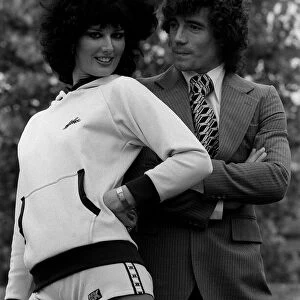 Kevin Keegan models a suit and the latest 1970s fashion with model wearing hotpants
