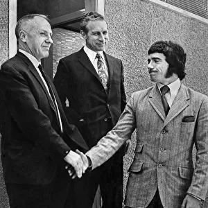 Kevin Keegan signs for Liverpool. Here he is pictured shaking hands with his new