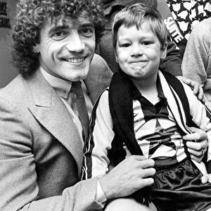 Kevin Keegan with five year old Robert Robertson at a furniture store opening