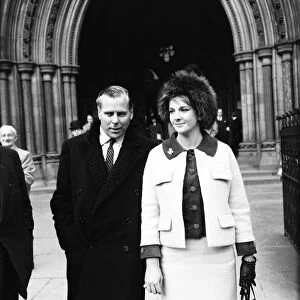 Kevin McClory, film producer, accompanied by wife and heiress Bobo Sigrist, High Court