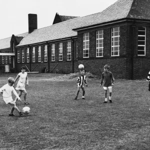 Kids playing a game of Football at Ravenswood Junior School Ravenswood Road Kids playing a game of Football at Ravenswood Junior School Ravenswood Road