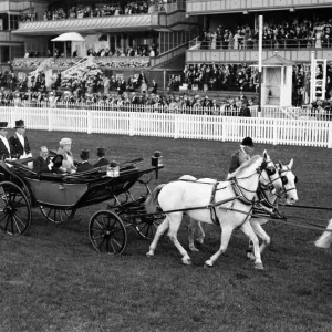 King George V and Queen Mary arrive at Ascot in horse drawn carriage with white horses King George V and Queen Mary arrive at Ascot in horse drawn carriage with white horses