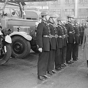 King George VI inspects firemen on his visit to Birmingham after a bombing raid in world