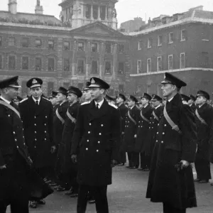 King George VI inspects the officers and crew of HMS Ajax