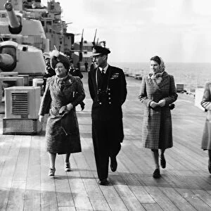 King George VI and Queen (now Queen Mother) on the deck of HMS Vanguard with their