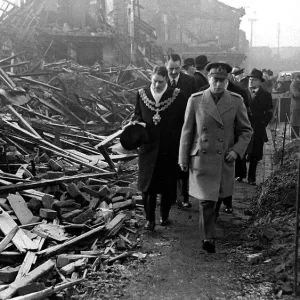 King George VI visits Birmingham to survey the bomb damage after a bombing raid in world