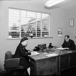 King and Hutchings accountants office, Mr Gadsby seen here with his secretary