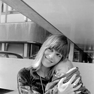 Kings College Hospital on 18 August 1969 Anita Pallenberg holds rolling Stone Keith