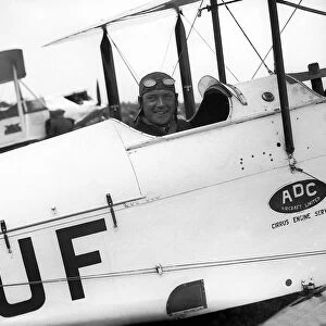Kings Cup Air Race 1928. Flying Officer J Neville Stack sits in the cockpit of his De
