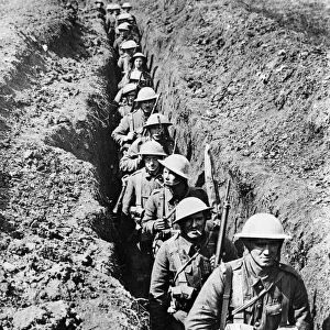 The Kings Liverpool Regiment moving along a communication trench leading to