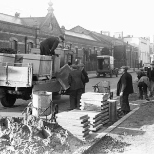 Kingston Council workmen seen here replacing the pavement just off off Kingston High Kingston Council workmen seen here replacing the pavement just off off Kingston High