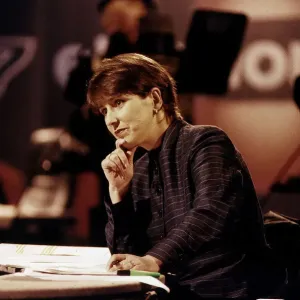 Kirsty Wark TV Presenter during Election results program sitting at desk in studio hand