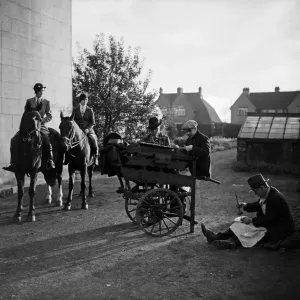 Knife grinders seen here at work in a unknown village in the East of England Circa 1935 Knife grinders seen here at work in a unknown village in the East of England Circa 1935