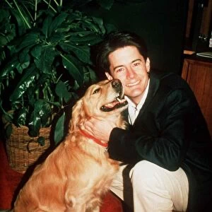 Kyle Maclachlan actor with Golden Retriever dog 1991