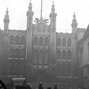 L. F.s Firemen attend a fire in the city of London on Sunday night near the Guildhall